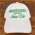 White ’47 Abandoned Golf Wives Social Club hat with Kelly green embroidery